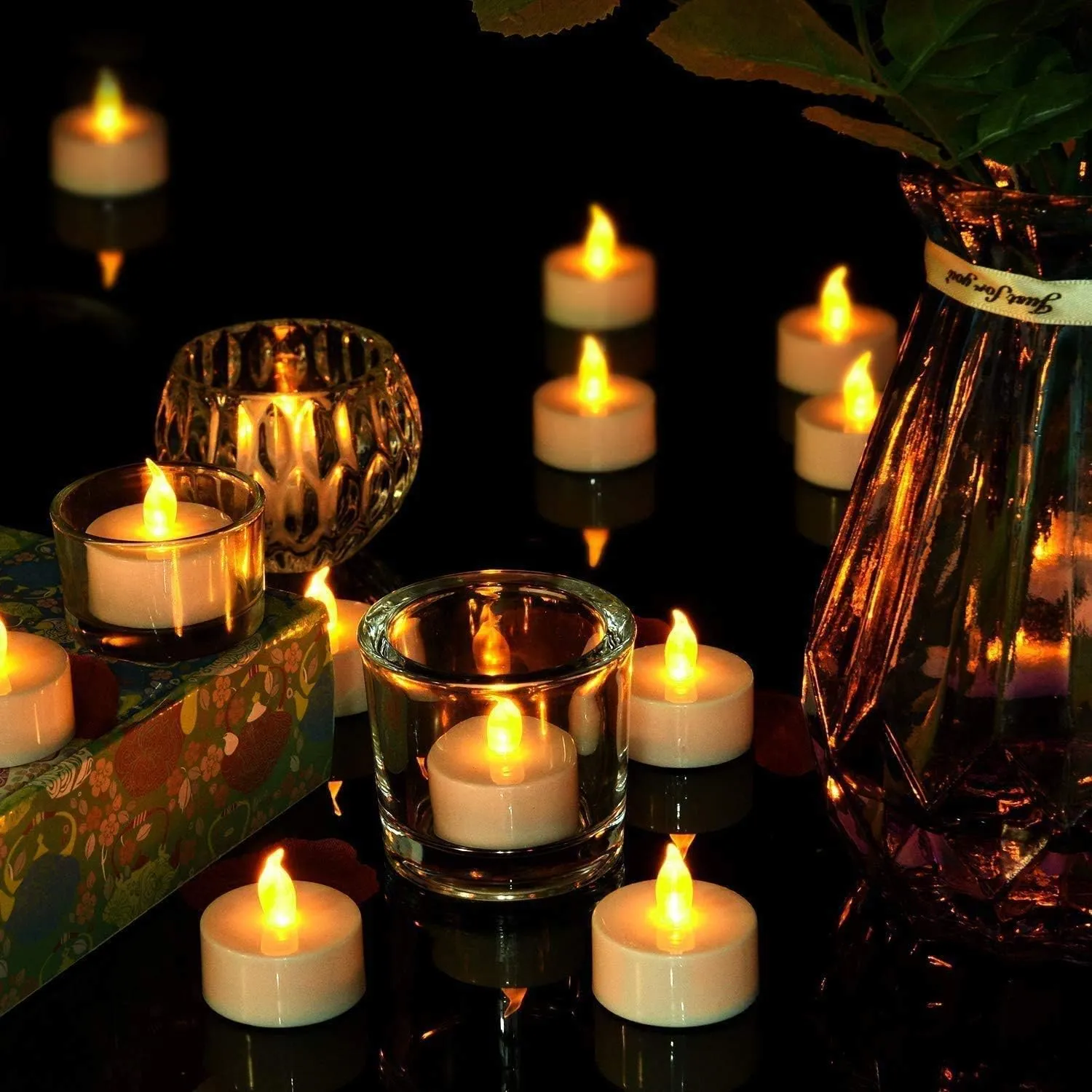 Battery Operated Led Tea Lights Candles:50 Pack Flameless Electric Fake Candle, Realistic and Bright Flickering Votive Tealights, Long Lasting 200 Hours,for Wedding,Party,Home Decoration (Warm Yellow)
