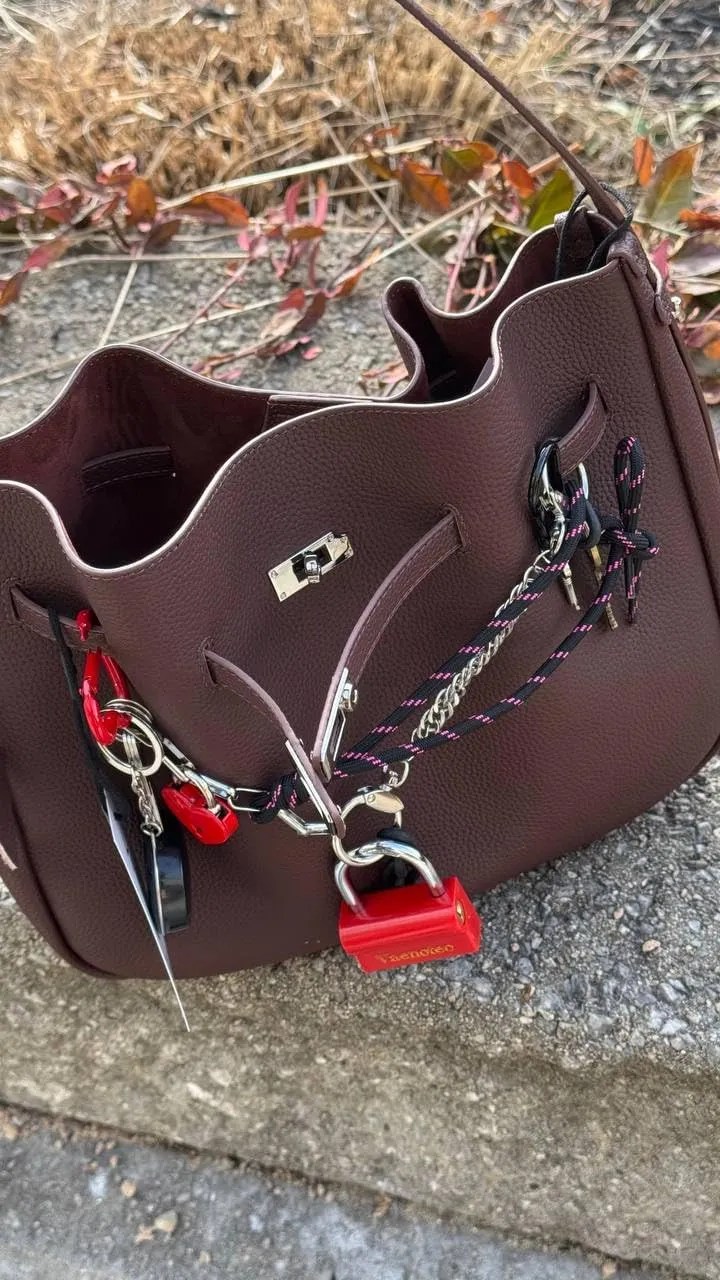 “Urban Grace” — A Totem of Uniqueness in Verdant Leather